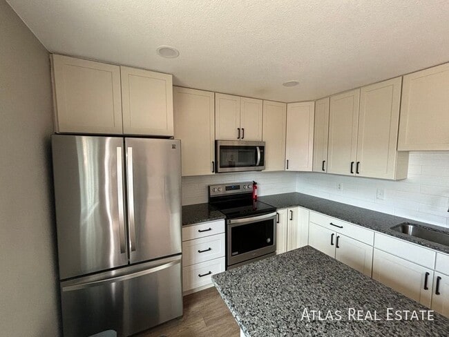 Building Photo - 12883 W Alameda Dr