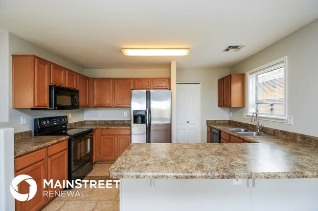 Building Photo - 42478 W Hillman Dr
