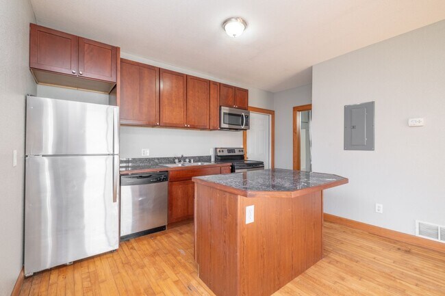 Building Photo - Welcome to this Lovely Two-Bedroom Lower U...