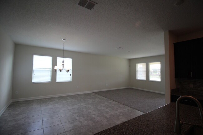Building Photo - Newer 4/3 Home at The Oaks in Moss Park wi...