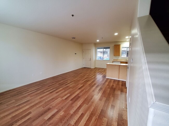 Photo - Great Location! 2 Bed 2 Bath Townhouse Style Condo! Open Concept! Laminate Floors Throughout Main!
