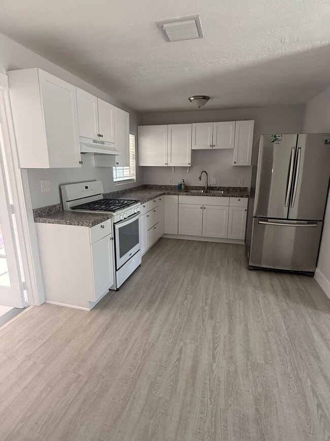 Photo - Renovated 4/3 Home ready to move in!