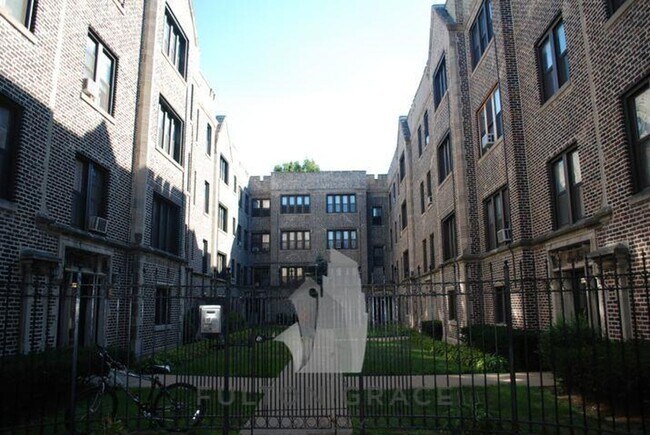 Building Photo - 1317 W Estes Ave