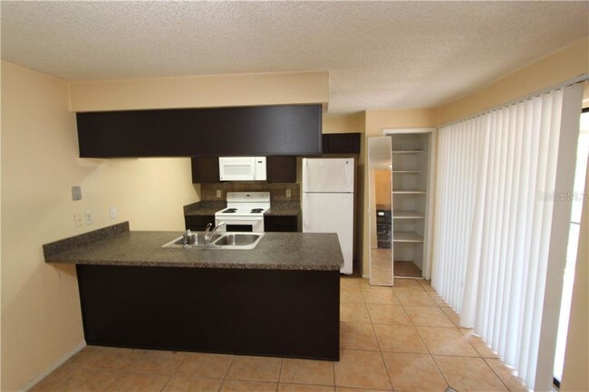 Building Photo - 8716 Hibiscus Ct
