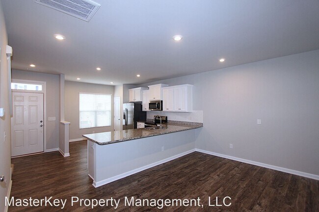 Foto del edificio - 3 br, 2.5 bath House - 8873 Commons Townes Dr