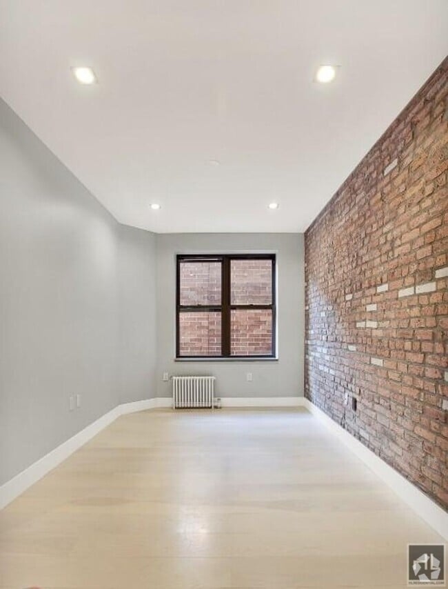 Building Photo - Renovated Lower East Side 1-Bedroom with M...
