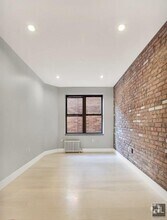 Building Photo - Renovated Lower East Side 1-Bedroom with M...