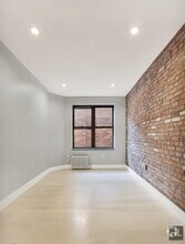 Building Photo - Renovated Lower East Side 1-Bedroom with M...