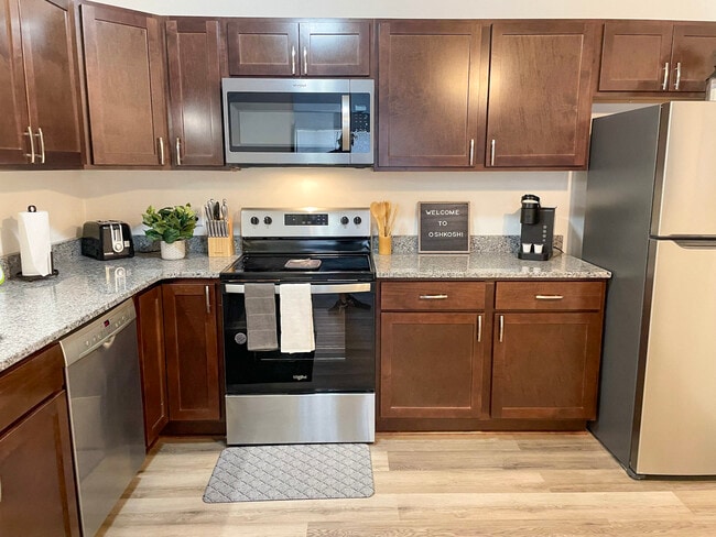 Building Photo - University Flats Furnished Housing