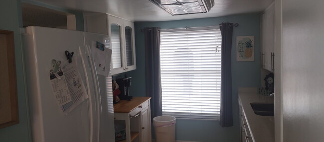 Building Photo - "Charming 2-Bed, 2-Bath Condo in Largo wit...