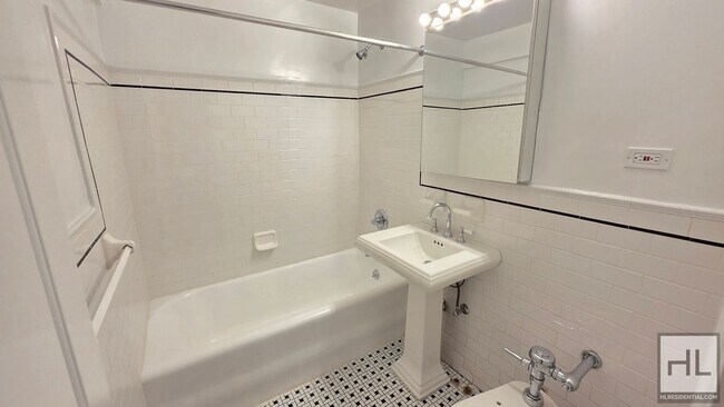 Building Photo - Oversized 3rd-Floor Studio with a Separate Windowed Kitchen in the West Village