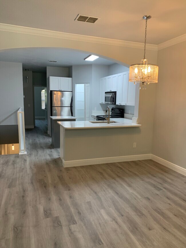 KITCHEN AND DINING AREA - 2250 Portofino Pl