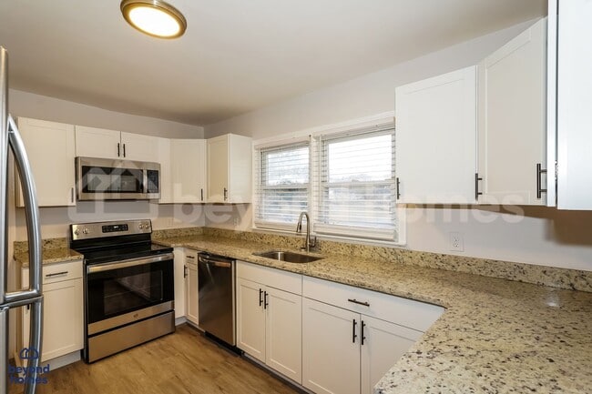 Photo - Updated Home with Fenced Yard + Bonus Room - Ready for Move-In Day!