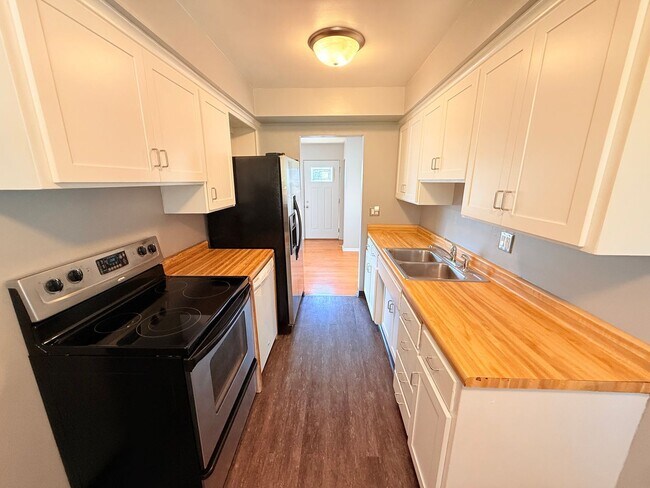 Building Photo - Spacious 4-Bedroom Moorhead Rambler with Updated Kitchen and Storage Shed
