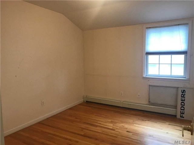Building Photo - 121-24-121-28 8th Ave