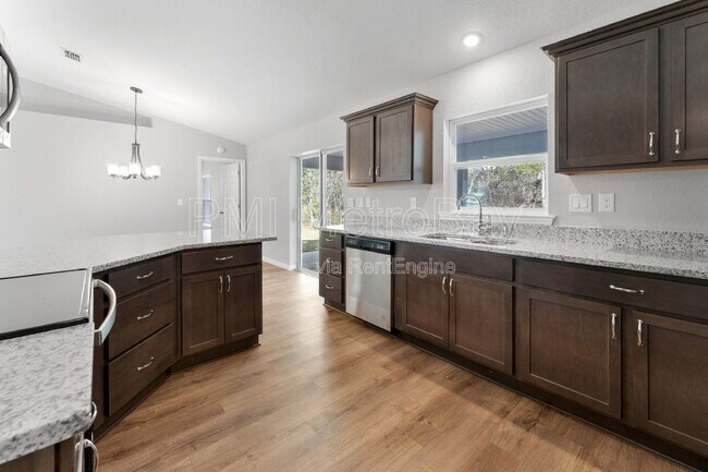 Building Photo - 9461 N Sandree Dr