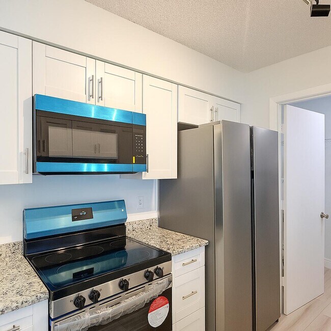 Foto del edificio - 4055 NW Cinnamon Tree Cir