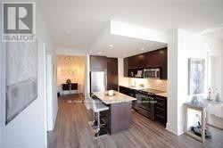 Photo du bâtiment - 100 Harrison Garden Blvd