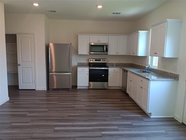 Building Photo - 7837 Pink Dahlia Dr