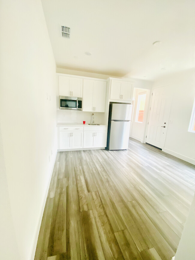 Living Room with Kitchenette - 4065 Happy Camper Way