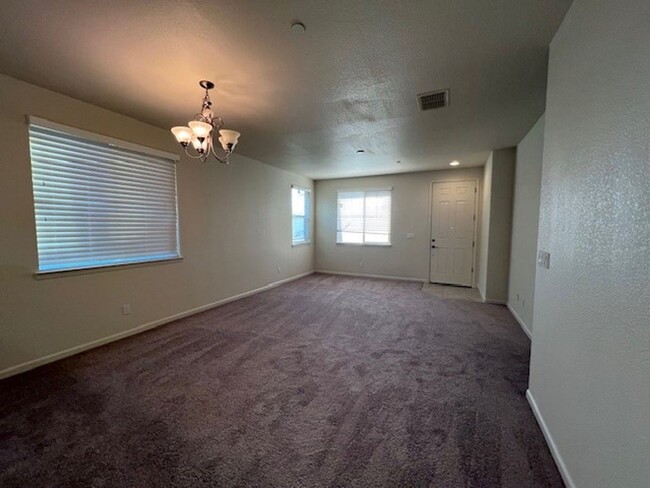 Building Photo - Freshly painted home with new carpet.