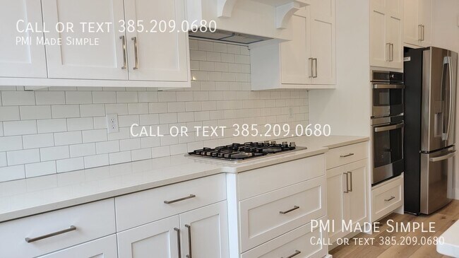 Building Photo - Reduced Price! Elevator, Finished Basement...