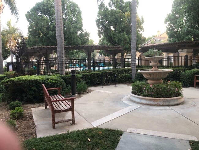 Common area near pool for sitting and relaxing . - 6395 Delgado Ln Townhome