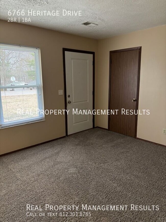 Building Photo - 6766 Heritage Dr