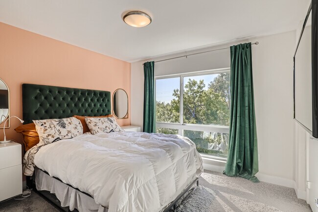 Primary Bedroom with large south facing window - 5563 W 10th Ave