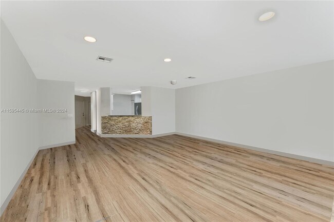 Building Photo - 10104 Royal Palm Blvd