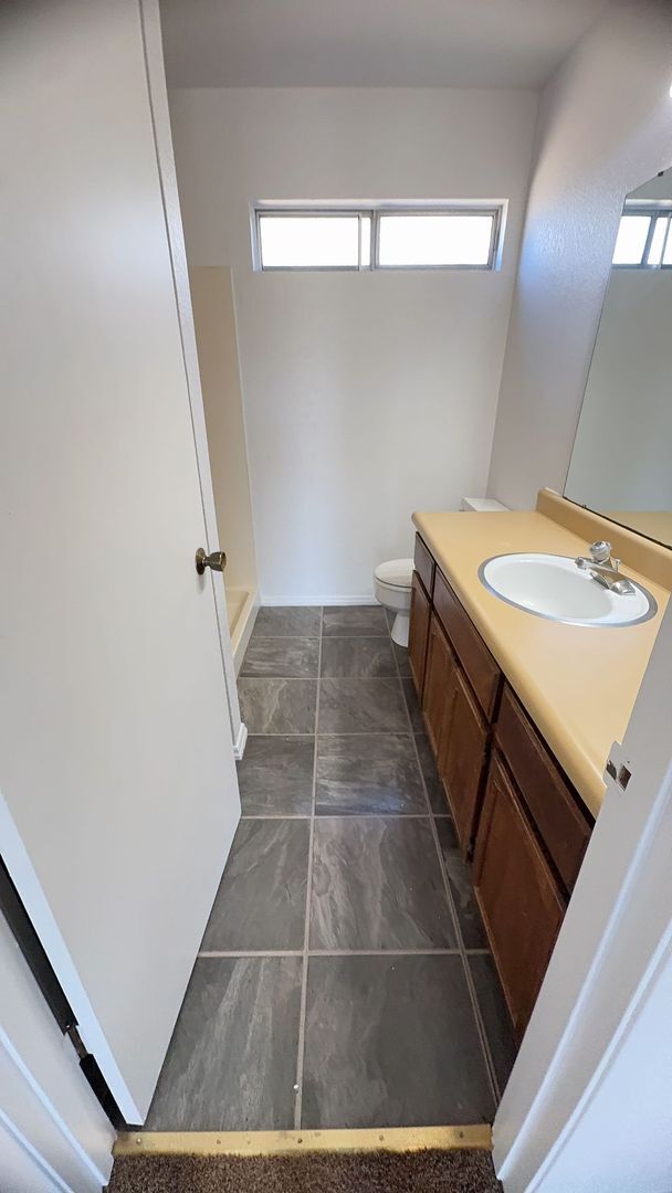 Building Photo - Experience the joy of lakeside living!