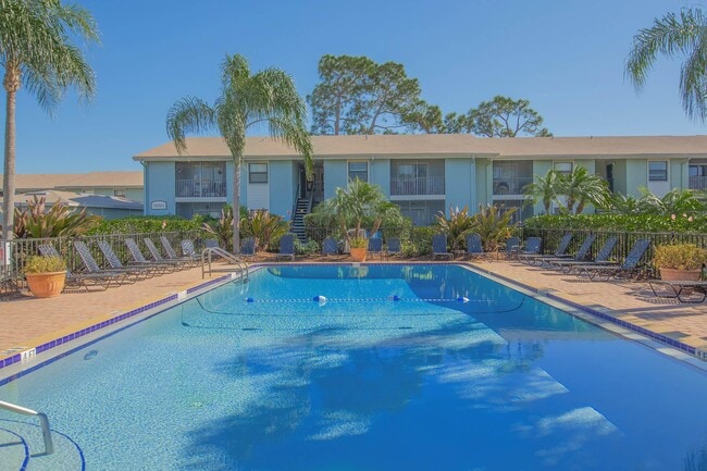 SOAK UP THE SUN BY THE SHIMMERING SWIMMING POOL - Sienna Bay Apartments