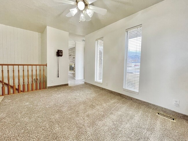 Building Photo - Spacious and Updated 4-Bedroom – Landscaping Included!