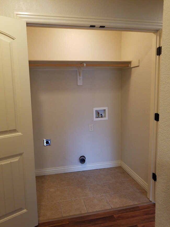 Laundry room in hallway - 3505 N Robin Ct #A