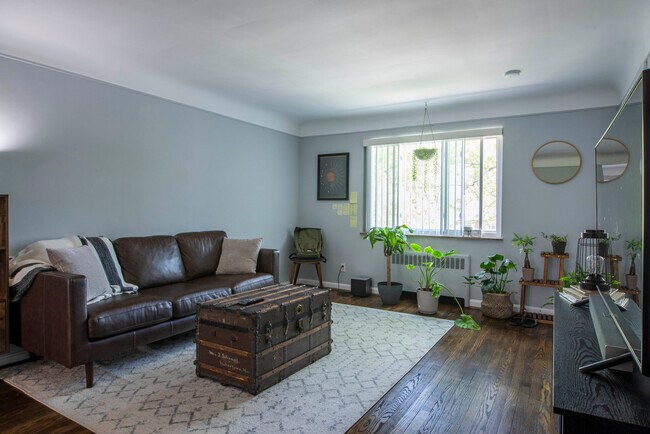 Large front window lets in lots of light to keep the unit bright and airy! - 1735 Sutton Ave