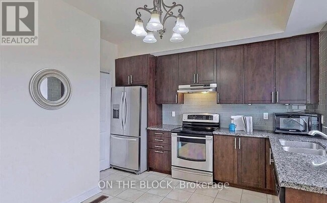 Building Photo - 3761A St Clair Ave E