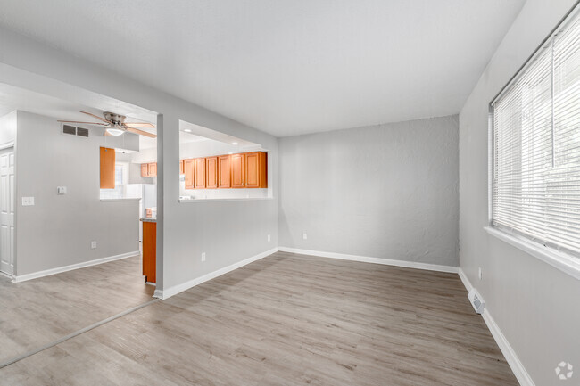 3BR, 1BA - 916SF - Living Room - Sunset Townhouses