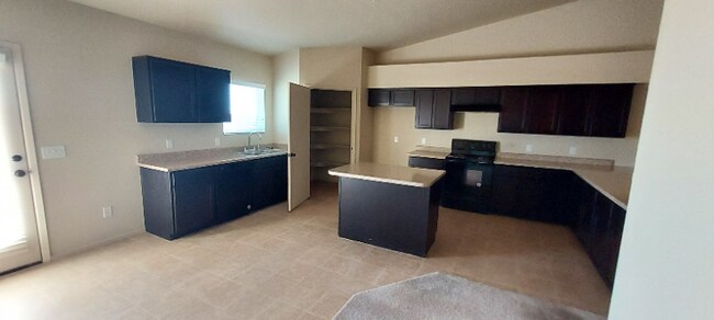 Foto del edificio - 7427 E 39th Pl