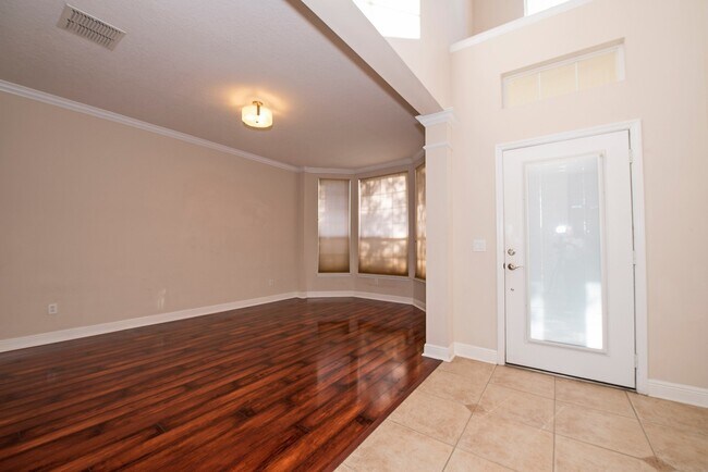 Building Photo - Spacious 4/3.5 with Stunning Lake Views in...