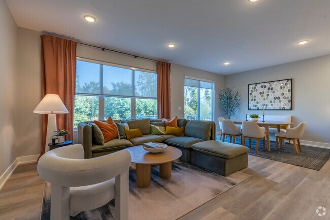 3BR, 2.5BA - 1,789SF - Duplex - Living/Dining Room - Okemos Grand Reserve