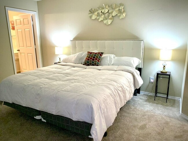 Primary Bedroom - 7018 Woodridge Row Dr