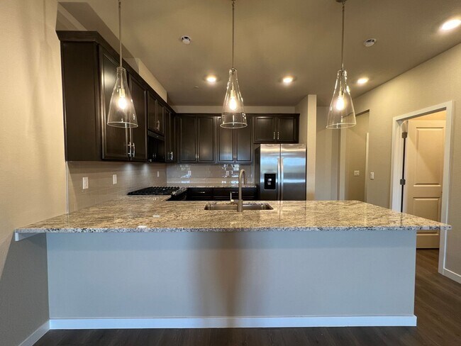 Building Photo - Brand New Townhome with fine finishes read...