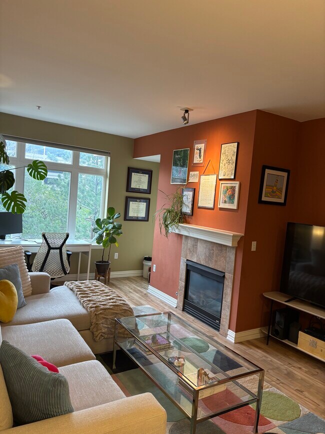 Gas fireplace. Large TV - 2700 E Cherry Creek South Dr