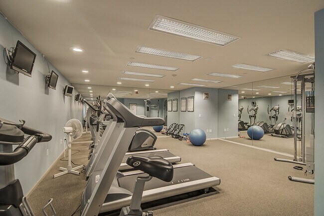 Building Photo - Top floor corner one-bedroom in the heart of it all, don't miss out, tour today!