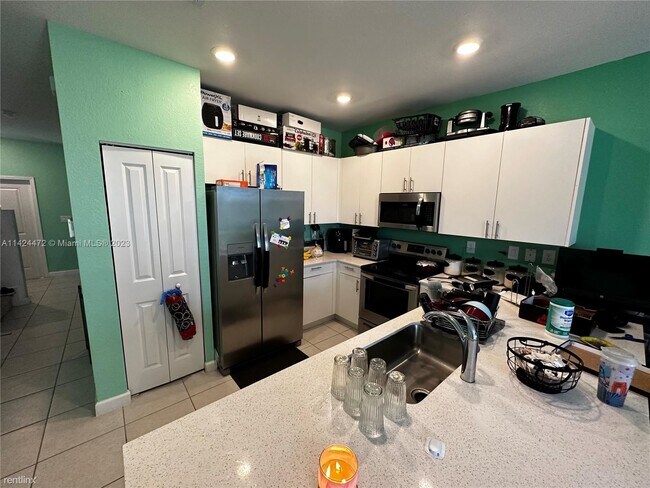 Building Photo - 3 br, 2.5 bath Townhome - 23317 SW 129th P...