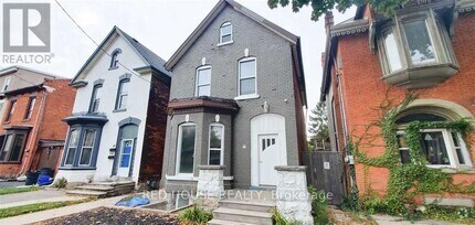 Building Photo - 77-77 Victoria Ave N