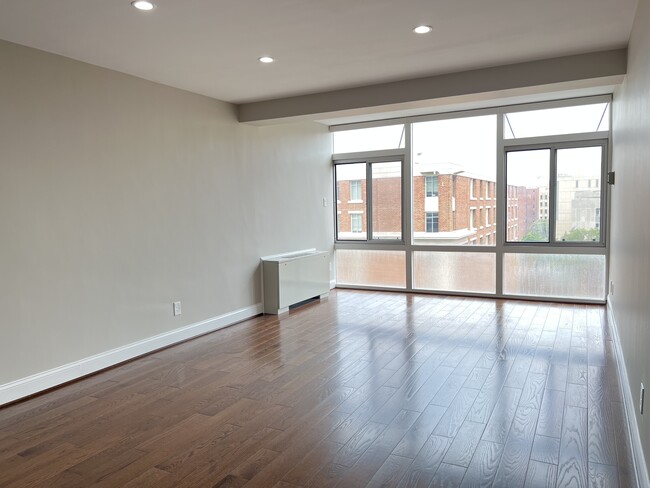 Floor to ceiling windows in main living area - 730 24th St NW