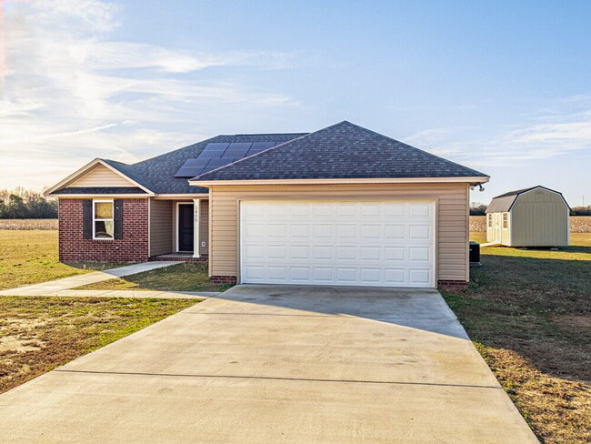 Building Photo - Available now! Has solar panels!