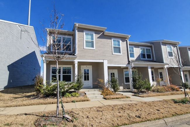 Building Photo - COMING SOON: 3BR Townhome • Full Kitchen • Garage + Driveway