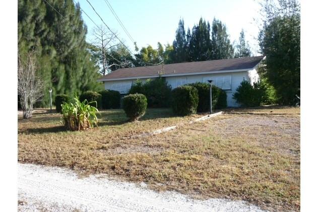 Foto del edificio - Sandy Cove Apartments & RV Park